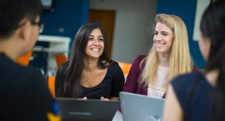 A group of students from the university enjoying student life at the Quay in Exeter